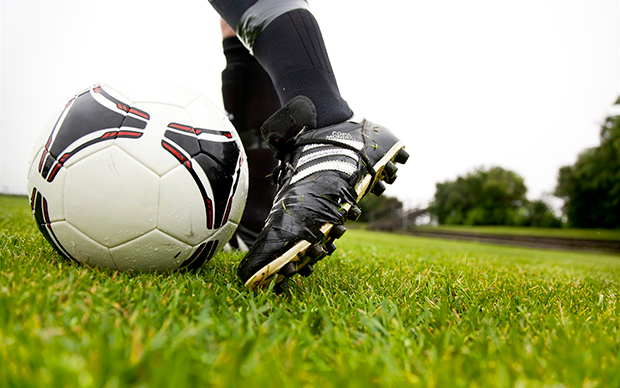 Fotboll och fot med fotbollssko