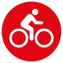 Rund röd skylt med piktogram för cykling.