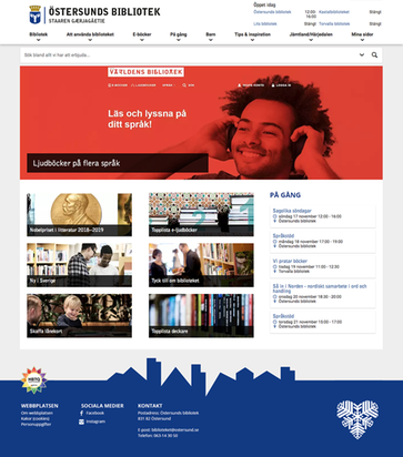 Webbplatsens startsida med logotypen, en menyrad under samt silhuetten i botten i profilblått med Östersundshjärtat i vitt.