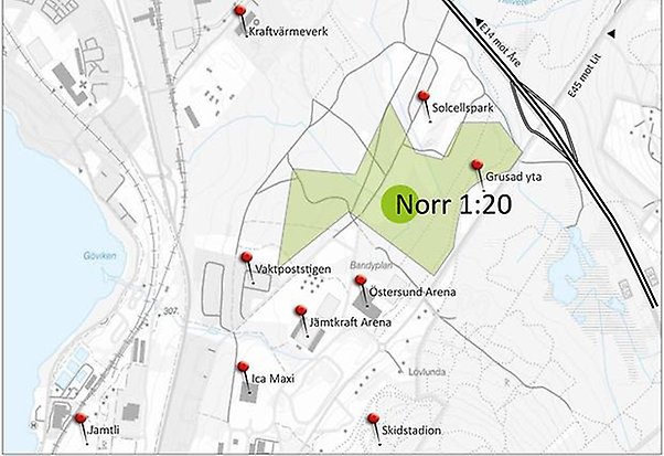 Karta med knappnålar i och en grönmarkerad fastighet